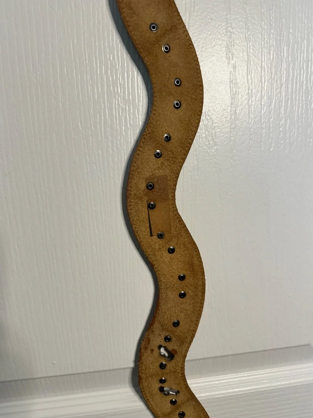 Vintage brown leather and silver colored metal articulated snake belt